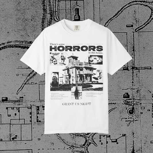 Grant Us Night Horror House white T-shirt with black graphic design text and a haunted house with ghosts and footprints and cursed objects and illustrations on a textured background