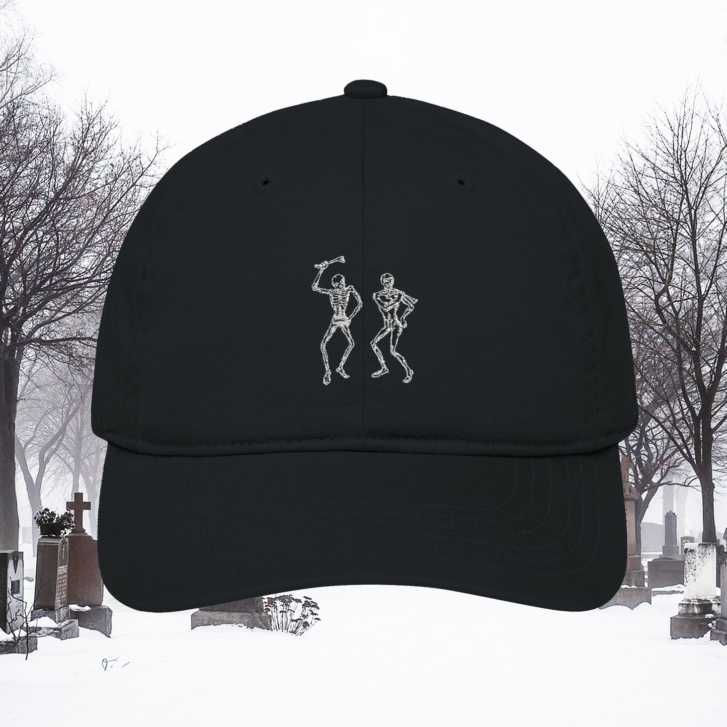 Grant Us Night black cap with white embroidered design of skeletons in a snowy cemetery