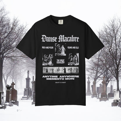 Grant Us Night black t-shirt with light gray graphic design of skeletons dancing with people and text that says "Danse Macabre, rich and poor, young and old, the great equalizer, anytime, anywhere, memento mori" on a foggy cemetery background