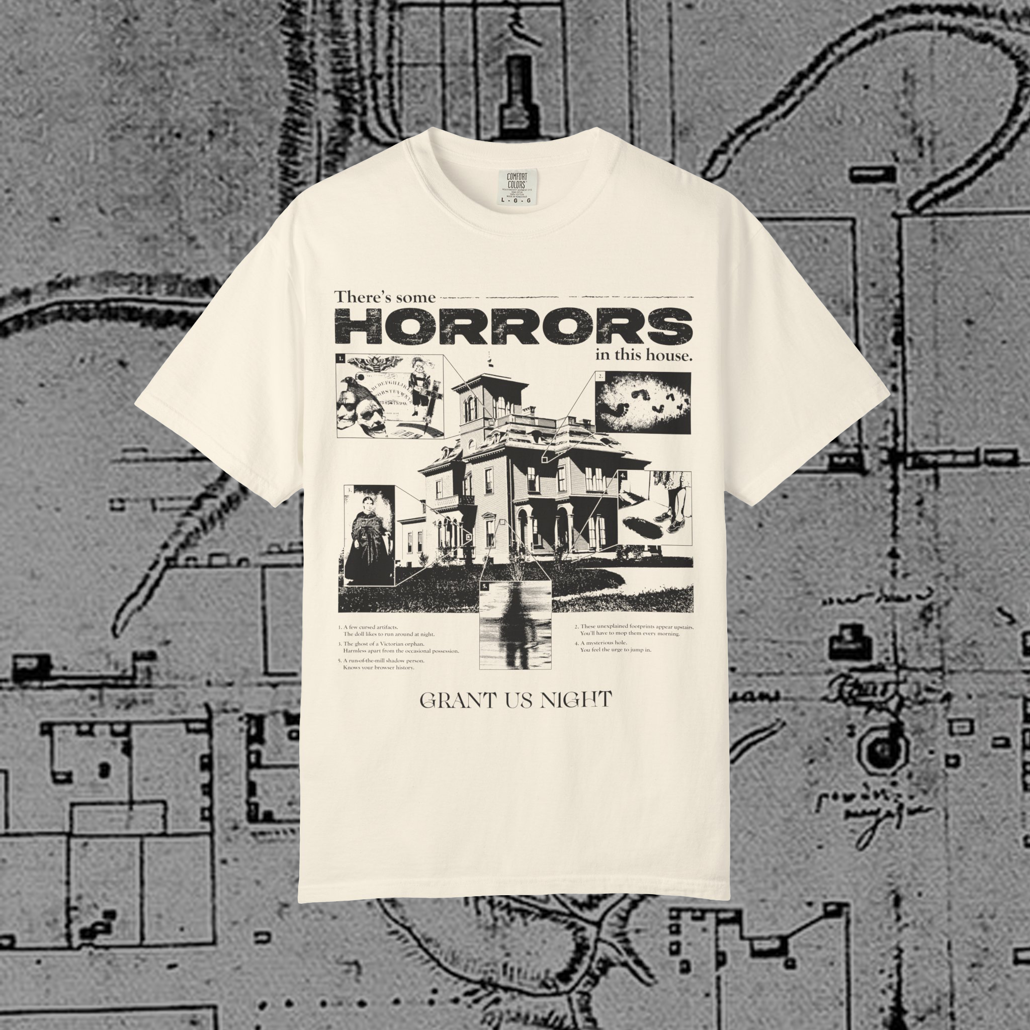 Grant Us Night Horror House off white T-shirt with black graphic design text and a haunted house with ghosts and footprints and cursed objects and illustrations on a textured background