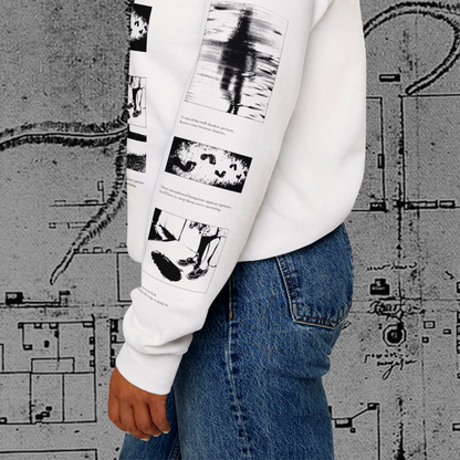 Grant Us Night Horror House white sweatshirt sleeve with black graphic design text and a haunted house with ghosts and footprints and cursed objects and illustrations on a textured background