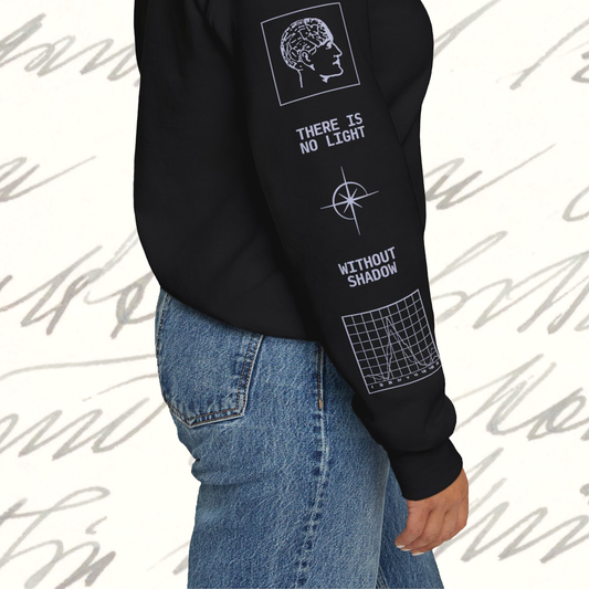 Grant Us Night Jungian Psyche black sweatshirt sleeve with black text and graphic design of figures and diagrams and chart and star on a white background