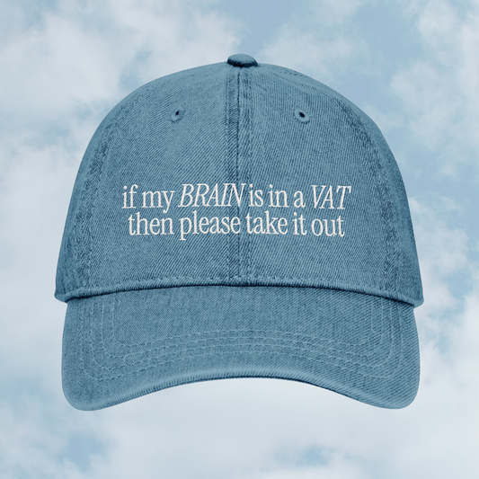 Grant Us Night Simulation Blue denim cap with 'if my brain is in a vat then please take it out' white text embroidered against a blue sky background
